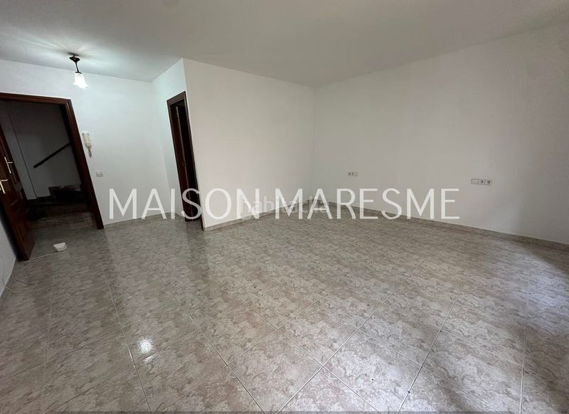 Foto f5a74b3b-38cf-46f2-8643-10bc7c456b98. Casa adossada a Canet de Mar