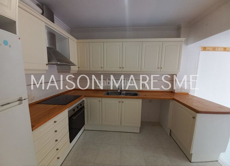 Foto 68b9e9bb-d598-4d05-84fe-5e9b5b3c4aeb. Duplex con camino riscaldamento parcheggio in Canet de Mar