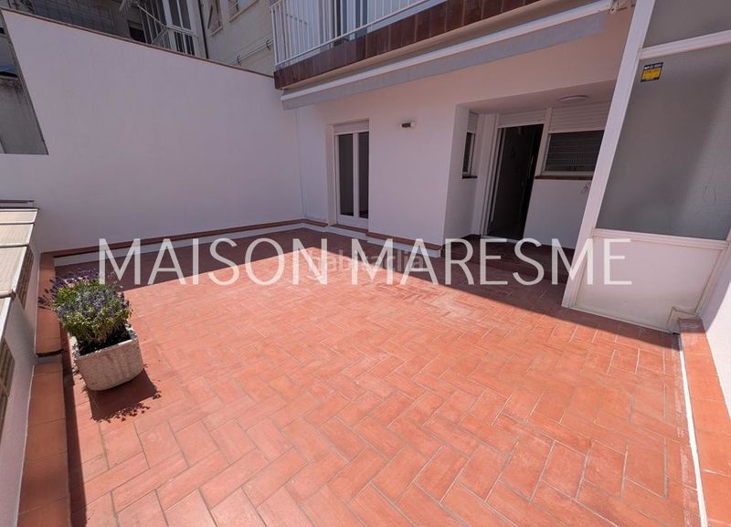 Foto b7391ea7-48d0-4c2c-9b90-1586be778405. Casa adossada amb xemeneia calefacció aparcament a Canet de Mar