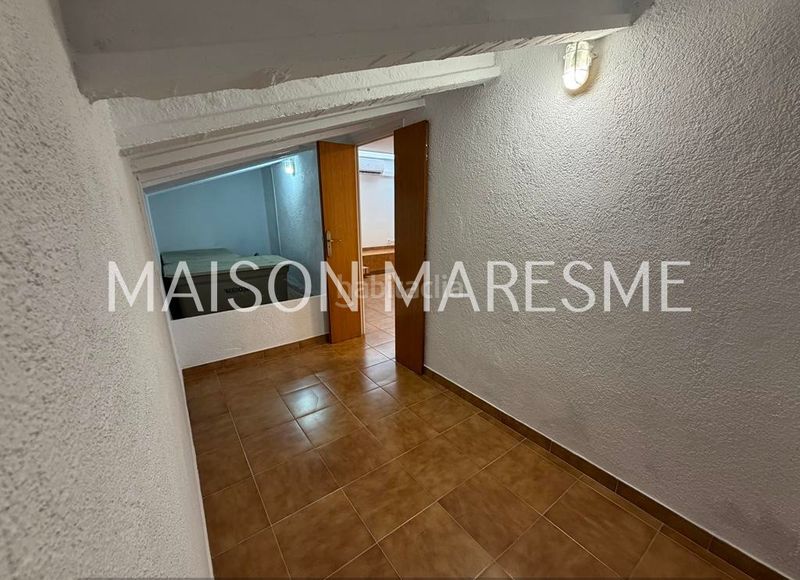 Foto ea8f68d3-4561-4d5c-9371-de62cfc769bf. Casa adossada amb xemeneia calefacció aparcament a Canet de Mar