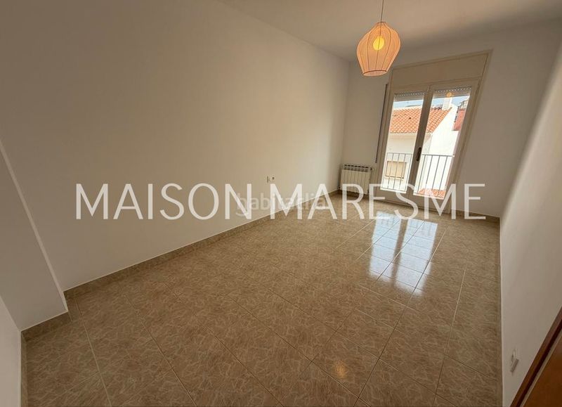 Foto ebc73d85-db7e-4036-8b6a-b3b9fcf93cc6. Casa adossada amb xemeneia calefacció aparcament a Canet de Mar