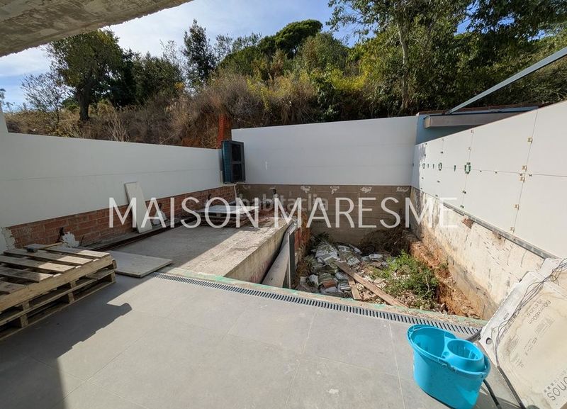 Foto d2e21220-2161-4139-a577-4000f6f568d1. Affitto casa a schiera con riscaldamento parcheggio piscina in Canet de Mar