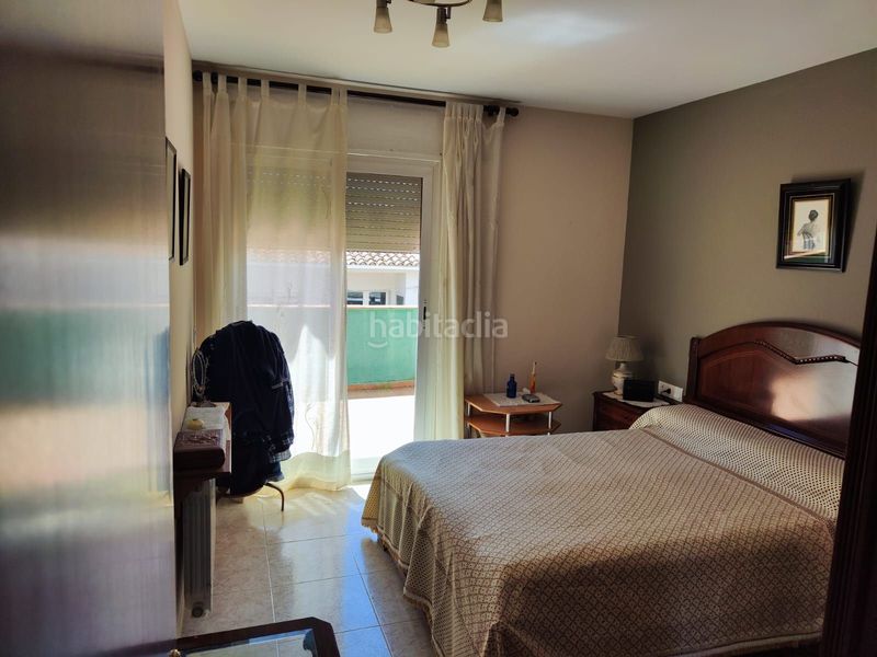 Foto f8434f9d-9e21-485e-9eca-34487dd73b6c. Casa adossada a Llagostera