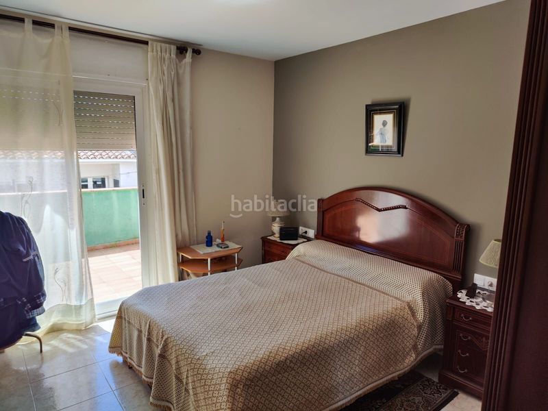 Foto f8ff02bf-78f2-49d2-9595-c55685082d1d. Casa adossada a Llagostera