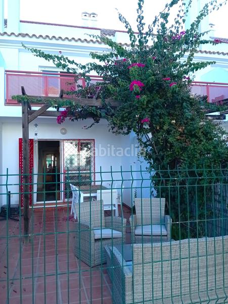 Foto 06c7cb9a-4127-41f2-941a-22cda010ca80. Casa adossada amb calefacció aparcament piscina a El Portil