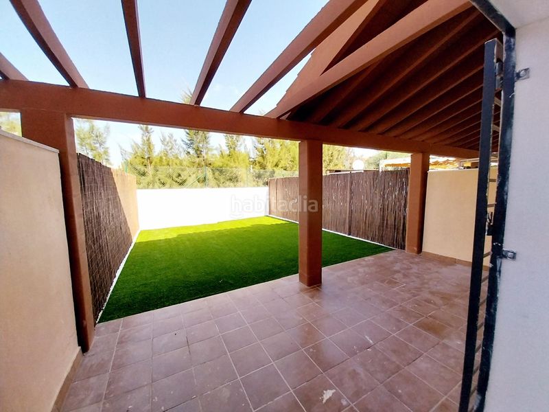 Foto e76b9694-7ab6-4ac7-8fd4-2ff5ad407d7e. Casa adossada amb calefacció aparcament piscina a Mijas