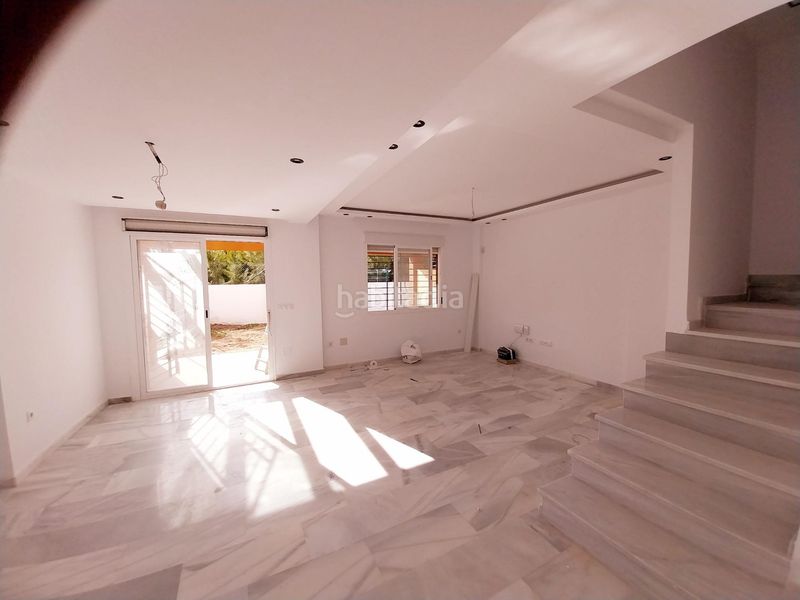 Foto 4660d4c6-3fbc-4946-b069-01db9df0cd10. Casa adossada amb calefacció aparcament piscina a Mijas