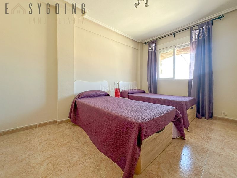 Foto fe63209b-bbf4-44d3-bb0e-885e5267b535. Casa adosada fantástico adosado familiar con piscina comunitaria y garaje privado en Santa Pola
