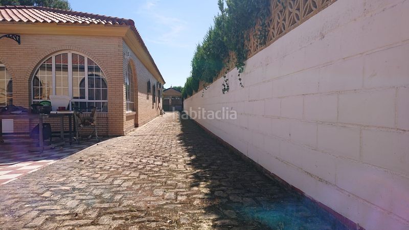 Foto 9922f494-a291-49f8-ae17-778d36aa06c8. Chalet en urbanización el martillo 23 en ramal de Espartinas Espartinas