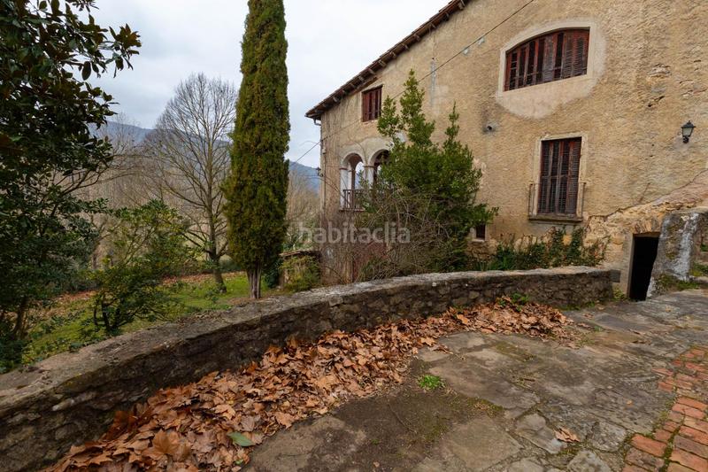 Foto 8a76dbdd-a10f-4877-9bb0-60d8a6ce4811. Masia amb calefacció aparcament a Vall d´en Bas (La)