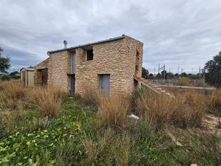 Masia a Aldea (L´). Finca rústica con casa de piedra