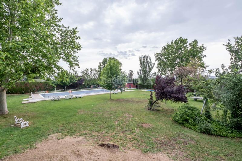 Foto cb5fb18e-7cd5-40c0-95e4-4126aeb1fec9. Chalet con riscaldamento parcheggio piscina in La Almozara Zaragoza