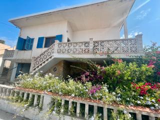 Casa aparellada a Sant Elm. Encantadora villa con vista al mar cerca de la playa en san telm