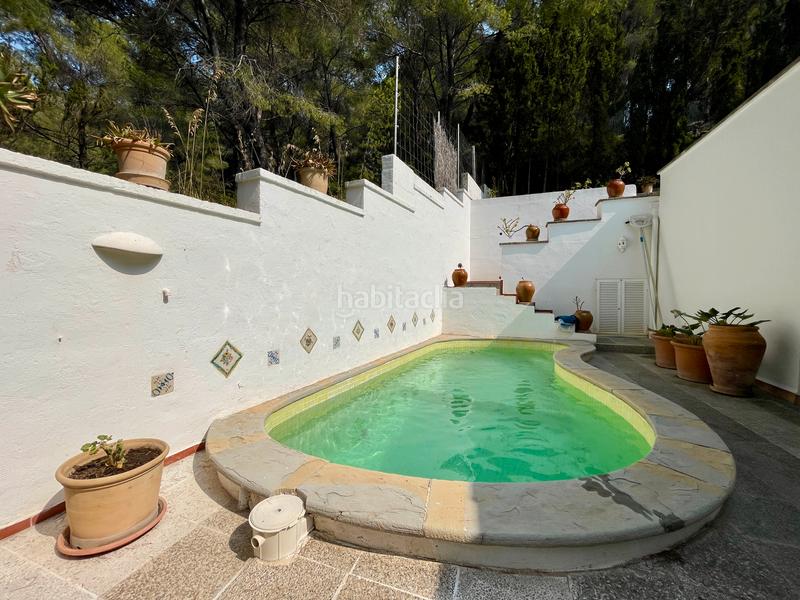 Foto d78c1994-113b-4670-b935-ed0ff701f6df. Casa pareada casa con piscina privada en cala san vicente en Pollença