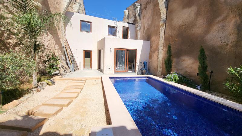 Foto 12b2d8f1-bfd8-491e-9fe4-b841324f44ff. Casa bifamiliare con piscina in Binissalem