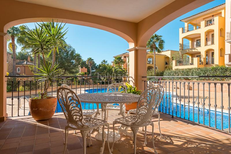 Foto 4ff458ae-cf6a-42dd-88eb-817f9bebd04c. Ático impecable ático con vistas parciales al mar y a poca distancia de port adriano y de la playa en Calvià