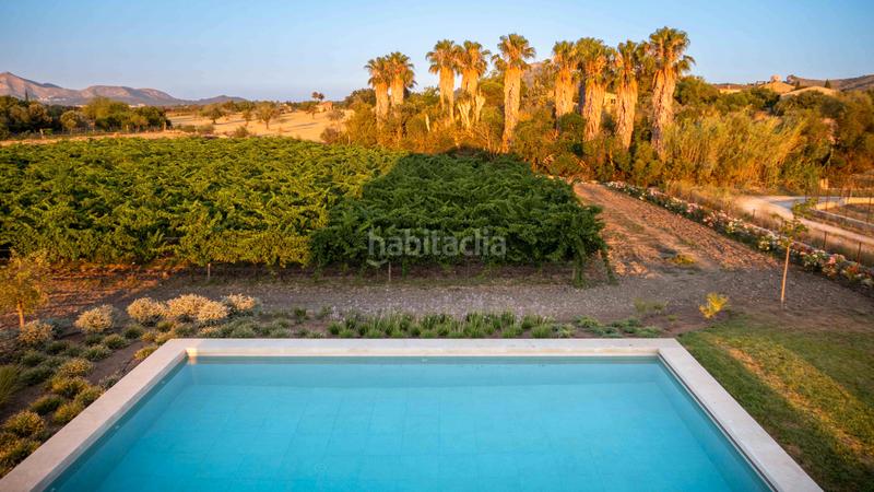 Foto 4d66c9ae-73ca-44e9-8ff0-7f5446b6cb8a. Masía exclusiva casa de campo de nueva construcción con viñedo propio y piscina en Alcúdia