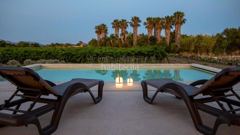 Foto 5c12185e-5894-4b45-9161-4ea25f8c854c. Masía exclusiva casa de campo de nueva construcción con viñedo propio y piscina en Alcúdia