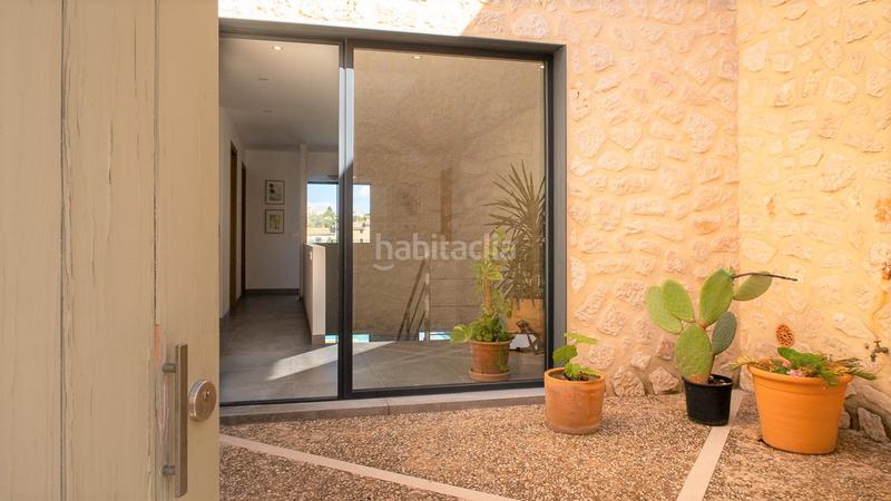 Foto 0f848b06-e7a2-40d2-b1ca-f4ff405db763. Casa bifamiliare con piscina in Campanet