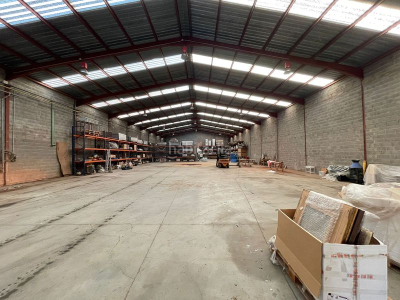 Foto d82fb895-66d3-4bd4-b977-15ae9bc8ae97. Nau industrial a Pobla Tornesa (la)