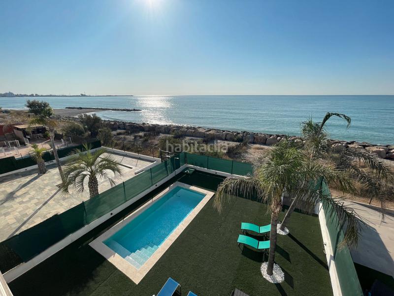 Foto 1a9a23f1-b000-4a19-b0be-8b1b3698d7c3. Chalet avec cheminée parking piscine dans Playa Burriana