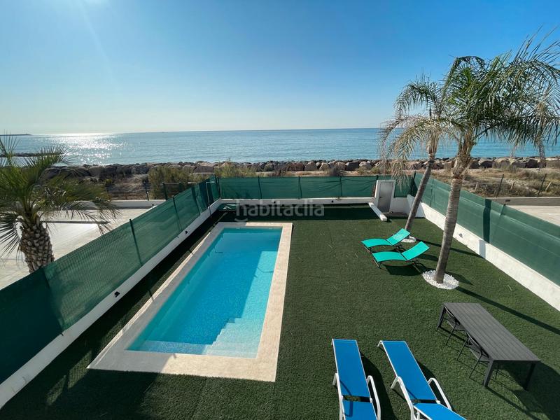 Foto 4e2391ec-c30e-40a7-8dc2-3df2bb683799. Chalet avec cheminée parking piscine dans Playa Burriana