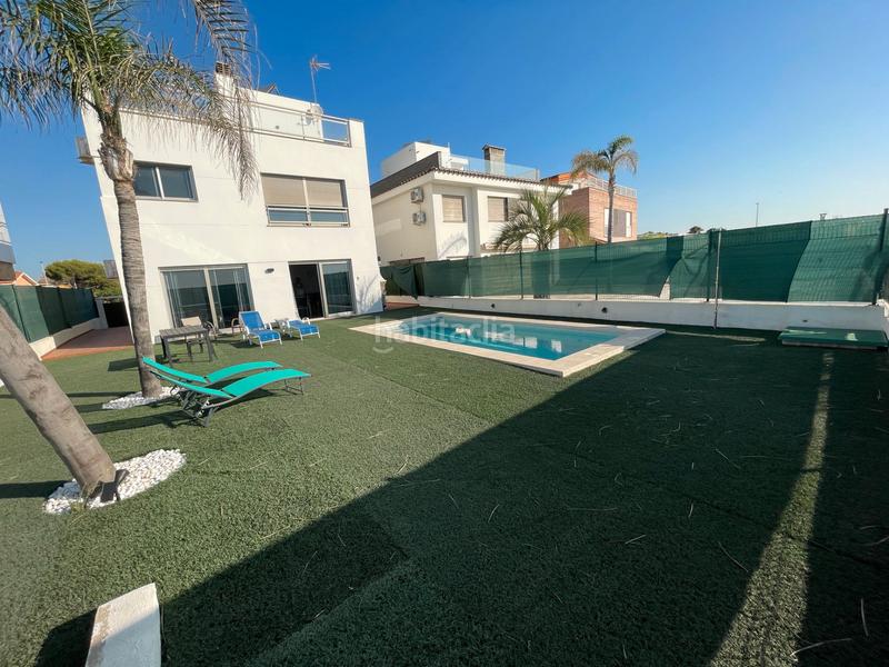 Foto 5595b4fd-10a6-439e-8421-e286f37c1307. Chalet avec cheminée parking piscine dans Playa Burriana