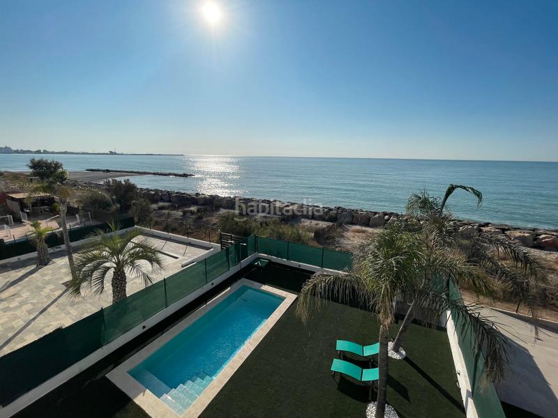 Foto 71a2914a-670d-4eff-b3b6-53ad2cc3d56a. Chalet avec cheminée parking piscine dans Playa Burriana