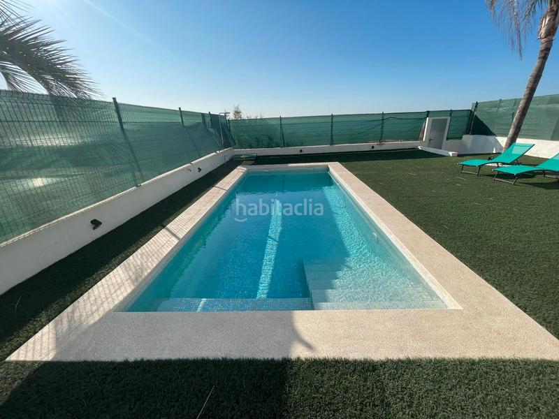 Foto 9273d346-4ce0-4dfd-881b-7e644a7e87e5. Chalet avec cheminée parking piscine dans Playa Burriana