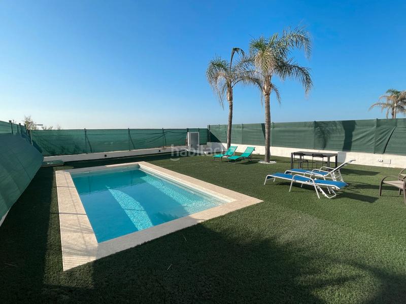 Foto 9309d4ec-6297-4240-a4e2-12aeca499c0d. Chalet avec cheminée parking piscine dans Playa Burriana