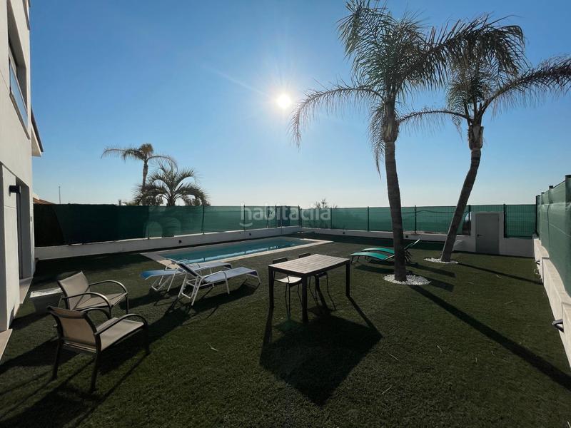 Foto a525387b-af30-436b-a749-ff70d0d1bd37. Chalet avec cheminée parking piscine dans Playa Burriana