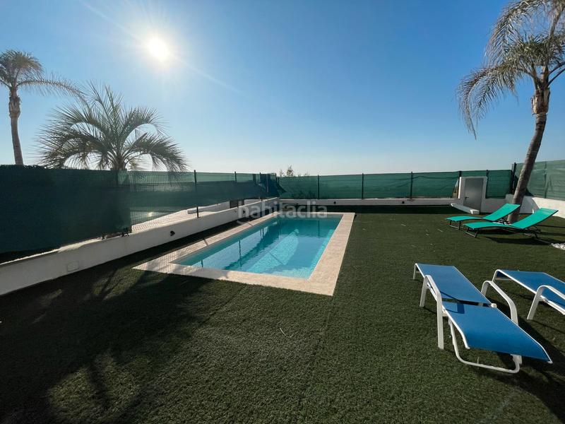 Foto f63a4582-a292-4e07-a4df-7039757da4f6. Chalet avec cheminée parking piscine dans Playa Burriana