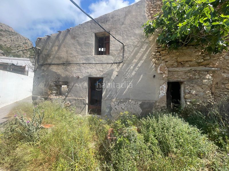 Foto c9433289-8cd3-483e-ab42-169bfa8bd50c. Casa adossada a Borriol