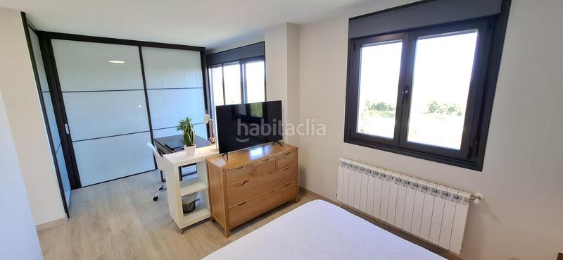 Foto 617d0f5d-d53f-4c41-91c6-55cb6990d43e. Dúplex amb calefacció aparcament piscina a Valdenoja Santander