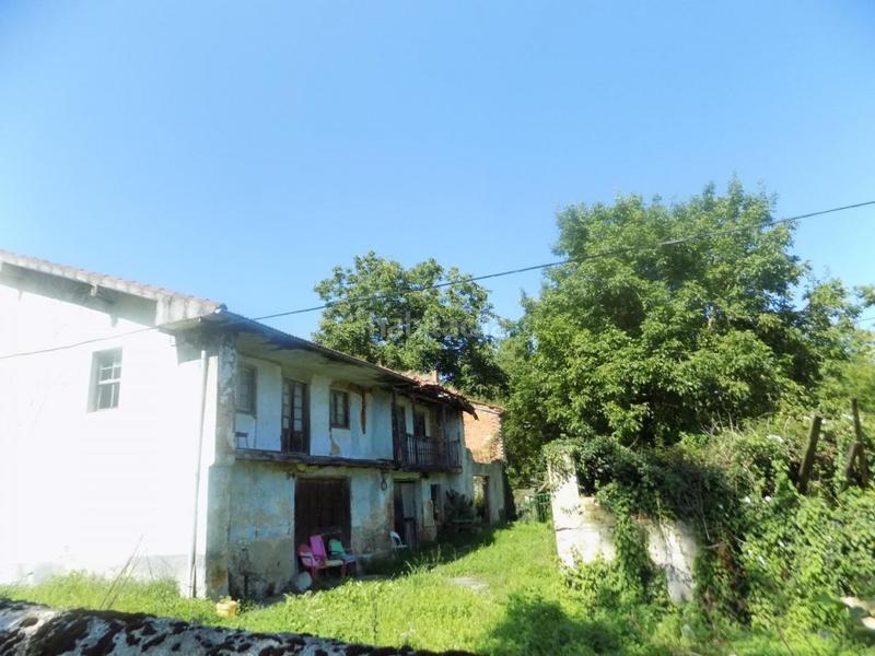 Foto 4aa54361-e90c-44e2-8279-93a34253b796. Casa adosada estupendo conjunto de tres casas para reformar en Escalante