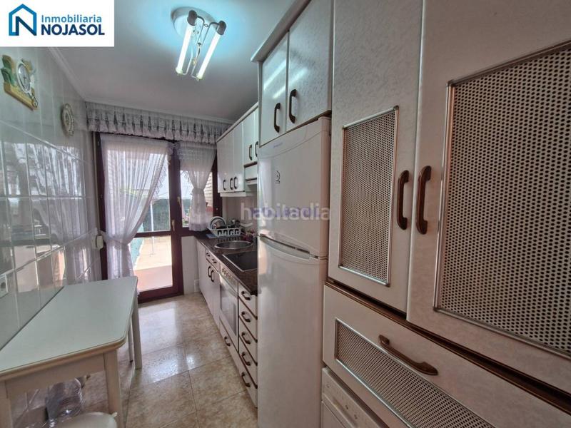 Foto 3212fe10-5775-4657-9321-17e6a8d935ca. Piso ref.000128 bajo de 3 habitaciones con jardin de 150m2, terraza de 40 m2, garaje doble, ascensor y calafacción en Noja