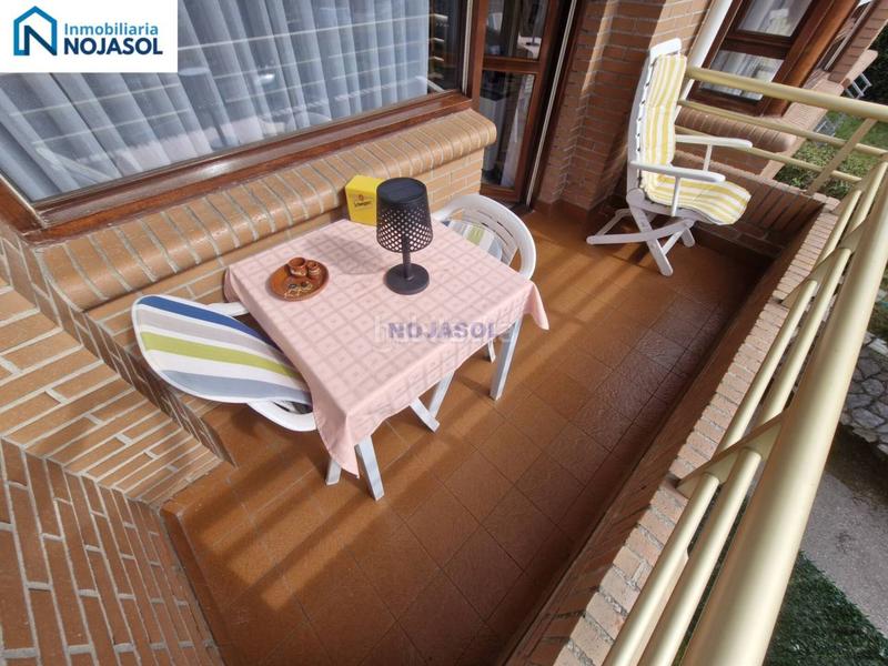 Foto e3b3a670-8562-43cd-9c85-709f9c5346b0. Piso ref.000128 bajo de 3 habitaciones con jardin de 150m2, terraza de 40 m2, garaje doble, ascensor y calafacción en Noja