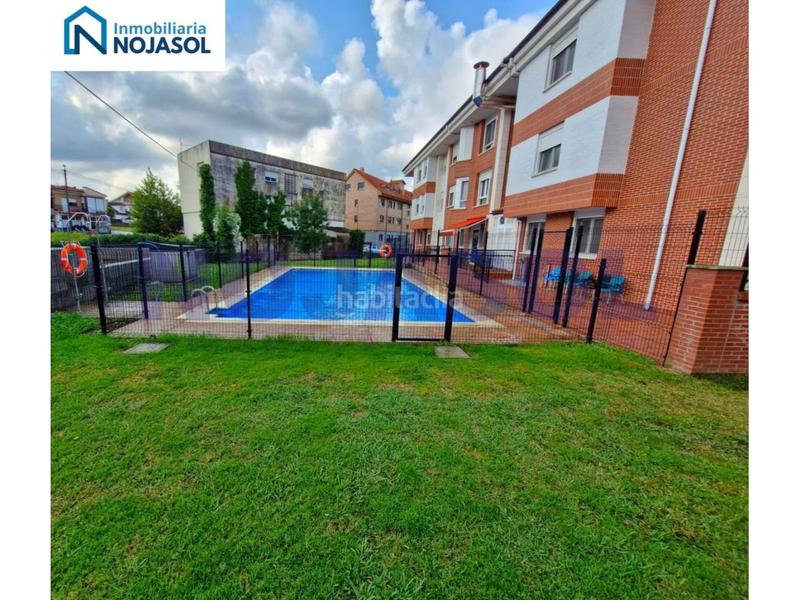 Foto 44eab992-6af6-4651-b1c8-4f194e1061a2. Apartamento ref 000523 precioso bajo con terraza en urbanización con piscina en Meruelo