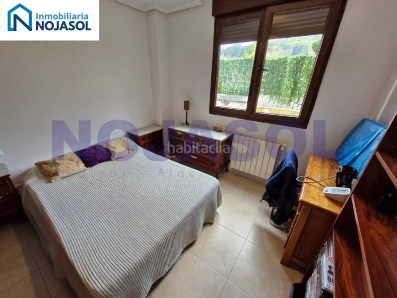 Foto 51f4be3c-fd0d-44fe-a60b-5b66e79307f4. Apartamento ref 000523 precioso bajo con terraza en urbanización con piscina en Meruelo