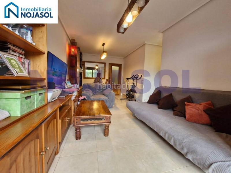 Foto c9d6d202-df36-4ac2-9ce5-fc68709b0481. Apartamento ref 000523 precioso bajo con terraza en urbanización con piscina en Meruelo