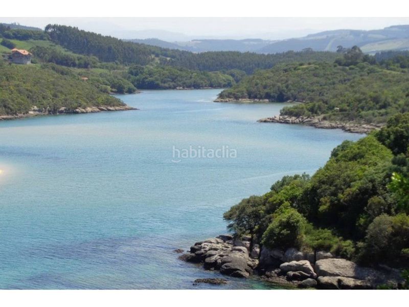 Foto 12aa7b57-ff98-49cf-9d05-4b4703e39d29. Casa aparellada amb calefacció aparcament piscina a Bareyo