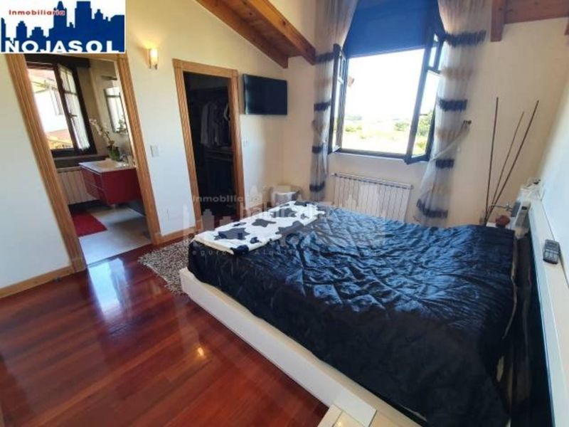 Foto 4c1611a0-a512-40aa-bb0f-21b9a24e88f6. Casa aparellada amb calefacció aparcament piscina a Bareyo