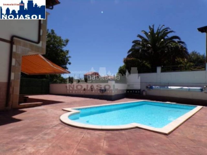 Foto a8185944-1bf9-410e-9e41-5b084782c03d. Casa aparellada amb calefacció aparcament piscina a Bareyo