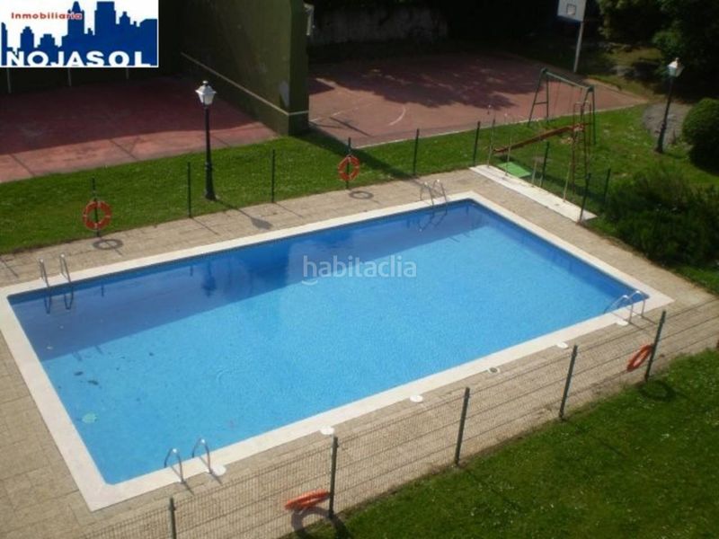 Foto 67fb7cc4-337f-4258-b941-f2c9054c7f1a. Alquiler apartamento en calle el bosque 5 ref.002065 piso 2 habitaciones con terraza, zonas verdes, piscina, pista baloncesto, fronton, parque infantil. en Noja