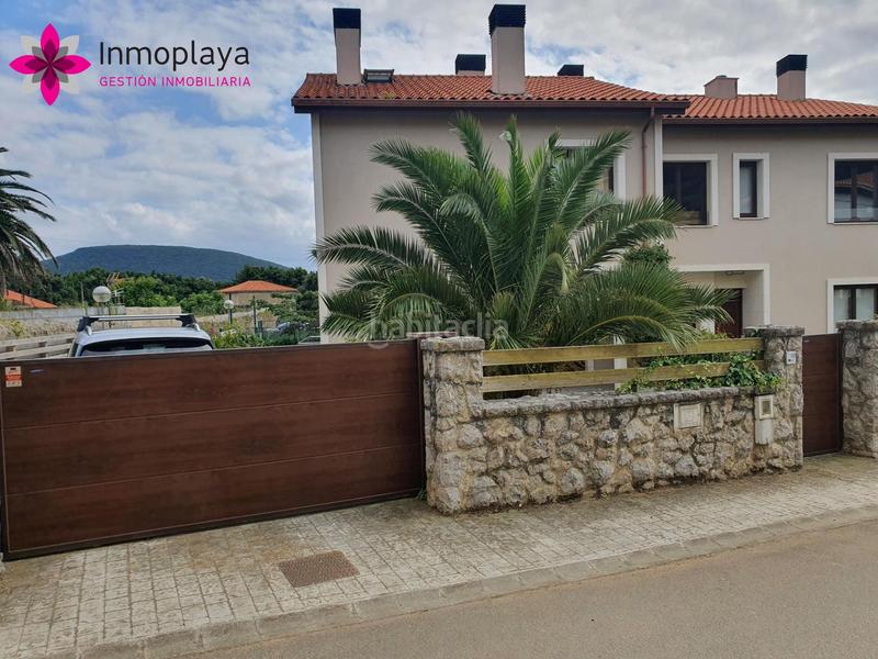 Foto 1dba5b1d-8385-46e6-b216-dcba9e82857b. Casa pareada espectacular chalet con piscina propia en isla en Arnuero