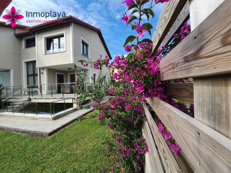 Foto f07d479a-bf3a-42cd-a016-86861be0700d. Casa pareada espectacular chalet con piscina propia en isla en Arnuero