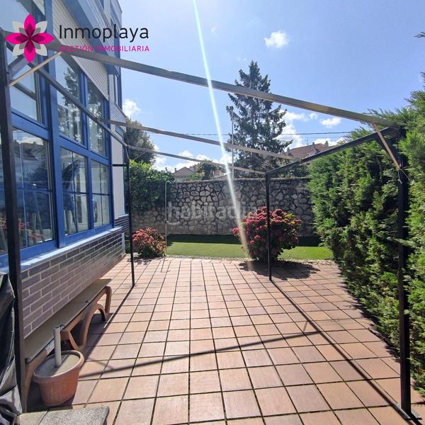 Foto 5bea12ef-af91-4770-88fc-14fbe1a39270. Planta baja espectacular bajo con jardín y piscina en Noja