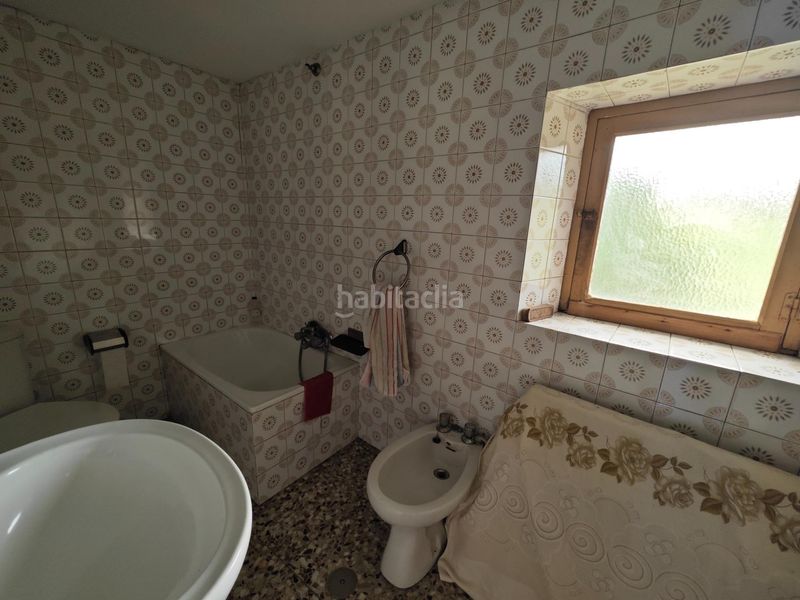 Foto c570f49f-0a99-4926-b5f3-564681630005. Casa adossada a Alfoz de Lloredo