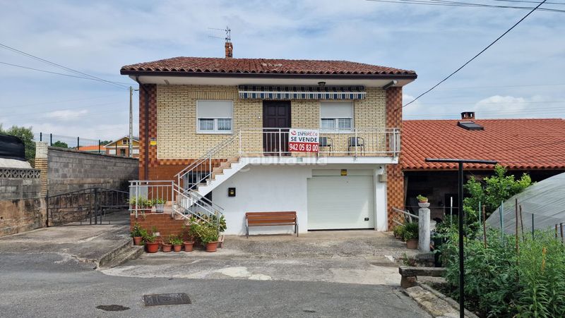 Foto 51a40424-229d-4ff2-ac65-e0c7af795c85. Casa amb calefacció aparcament a Tanos Torrelavega