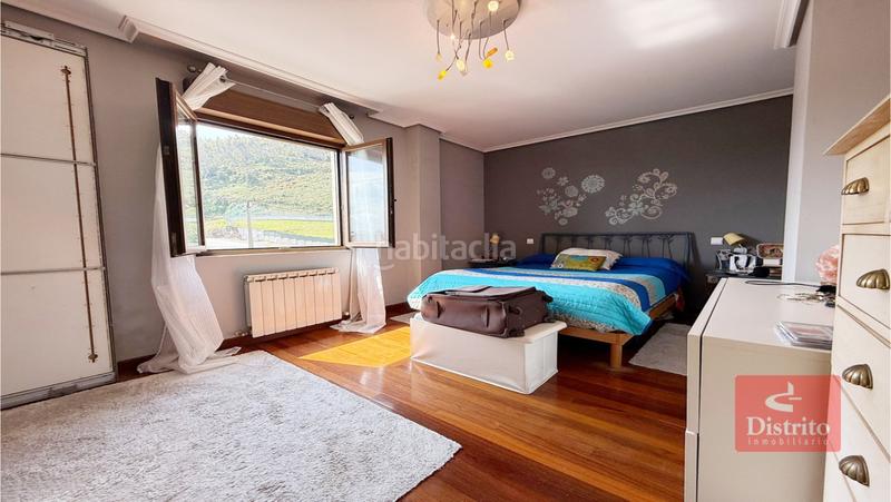 Foto 5713e843-3cc7-4ec1-85d7-67d73da82bf1. Casa aparellada amb calefacció aparcament a Liencres Piélagos
